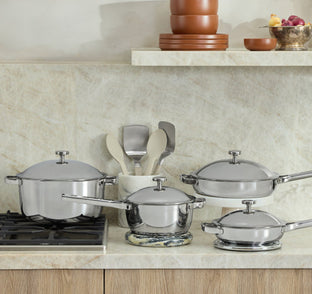 titanium perfect pot, mini perfect pot, always pan and mini always pan on stove and counter